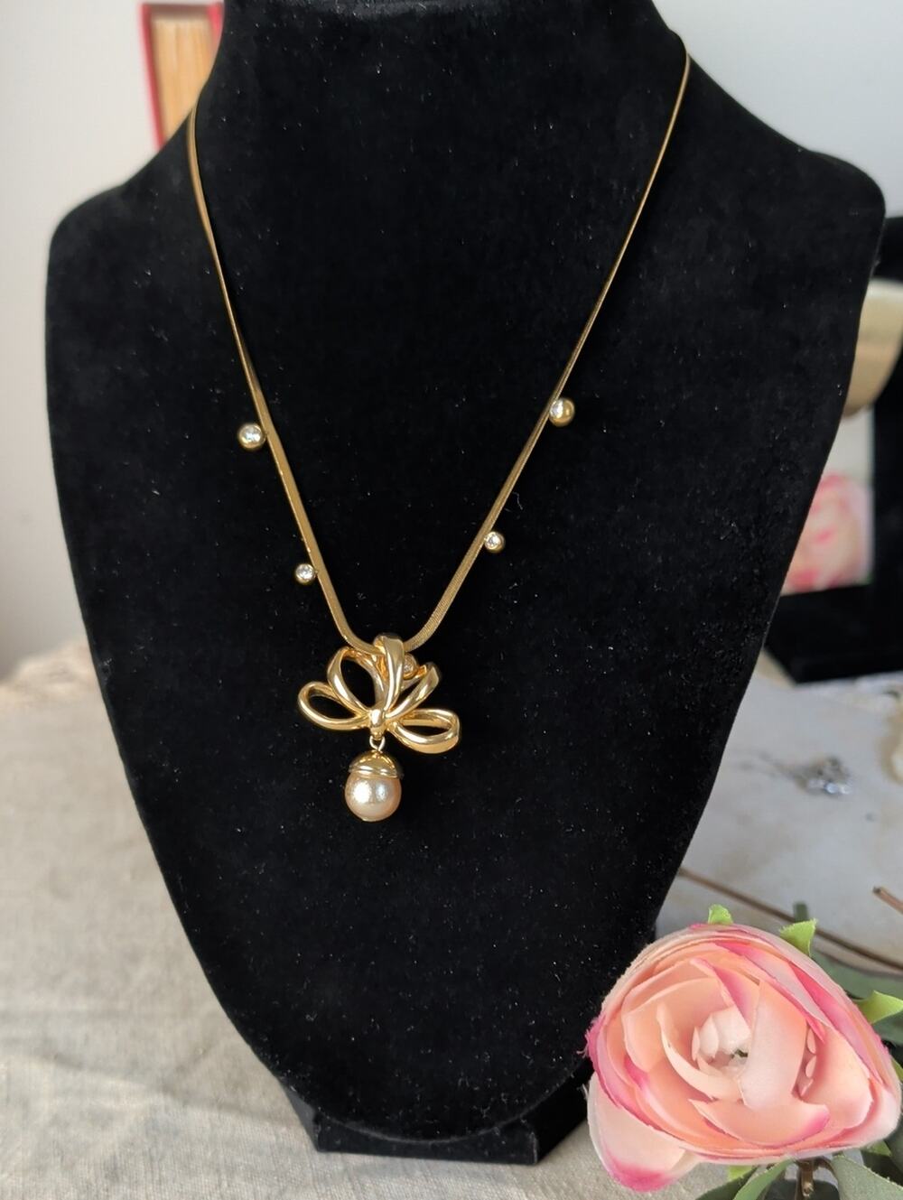 Vintage 1990s Nolan Miller Gold Tone Bow Necklace Faux Pearl Drop CZ Snake Chain
